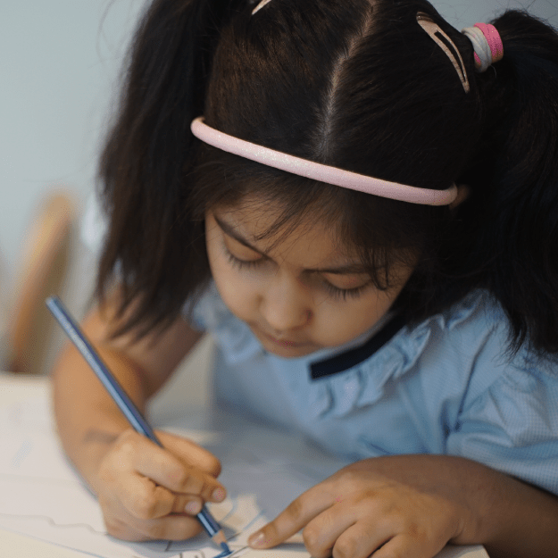 Teacher and child playing